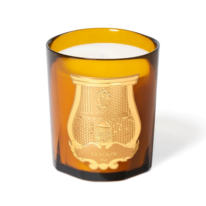 Trudon - Altaïr - Duftkerze im bernsteinfarbenen Glas mit goldfarbenem Wappen und holzig-blumigem Dufterlebnis