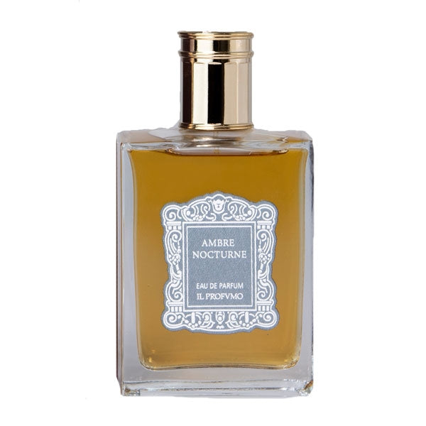 Il Profumo - Ambre Nocturne Parfumflakon mit bernsteinfarbenem Duft und goldenem Verschluss vor weißem Hintergrund