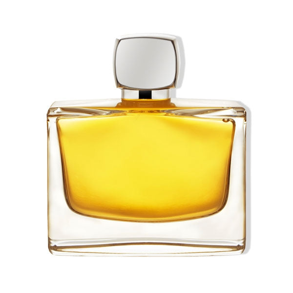 Jovoy - Ambre Premier Parfumflakon mit klarem Glas und bernsteinfarbener Flüssigkeit vor weißem Hintergrund