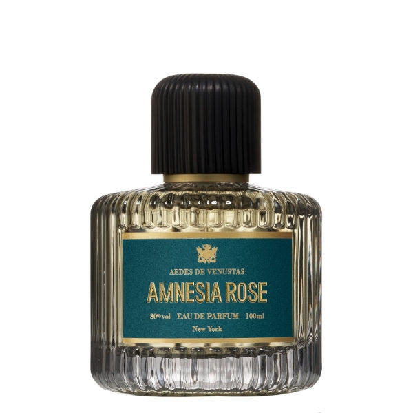 Aedes de Venustas - Amnesia Rose Parfumflakon mit geriffeltem Glas und grünem Etikett vor weißem Hintergrund