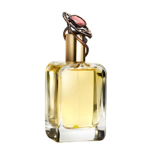 Mendittorosa - Amygdala Parfumflakon mit goldfarbenem Verschluss und rosa Schmuckstein auf weißem Hintergrund