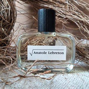 Anatole Lebreton - Racine Carrée Parfumflakon aus klarem Glas mit schwarzem Holzverschluss und natürlichem Dekor