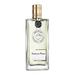 Nicolaï - Angelys Pear klarer Flakon mit goldfarbenem Verschluss und schlichter Etikettgestaltung elegant präsentiert