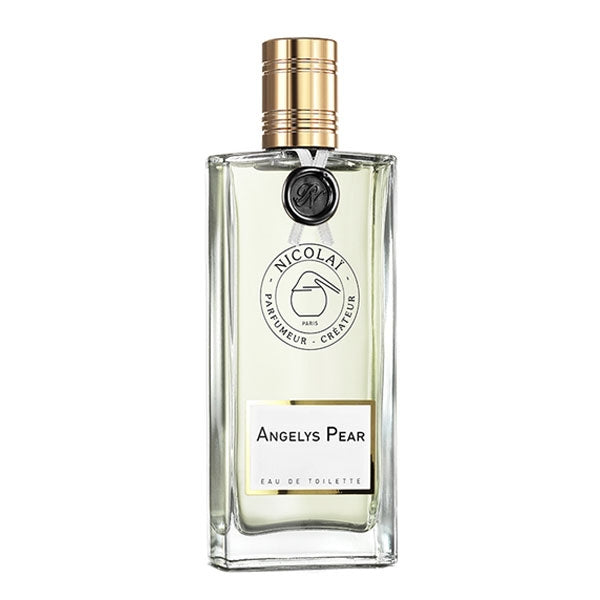 Nicolaï - Angelys Pear klarer Flakon mit goldfarbenem Verschluss und schlichter Etikettgestaltung elegant präsentiert