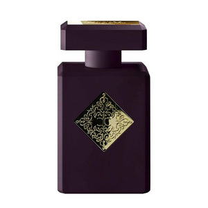 Initio - Carnal Blend - Atomic Rose Parfumflakon in dunklem Design mit goldener Verzierung auf weißem Hintergrund