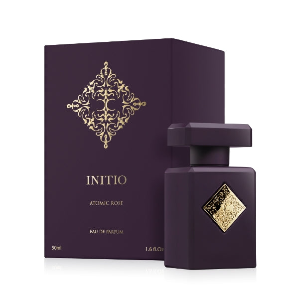 Initio - Carnal Blend - Atomic Rose Parfumflakon und Verpackung in dunklem Purpur mit goldener Ornamentverzierung