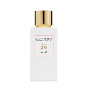 Eau d'Italie - Au Lac eleganter weißer Flakon mit goldenem Verschluss und minimalistischem Etikett vor weißem Hintergrund