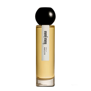 Hima Jomo - Seasons - Autumn in Lhoka eleganter Parfumflakon mit schwarzem kugelrundem Deckel und bernsteinfarbener Flüssigkeit