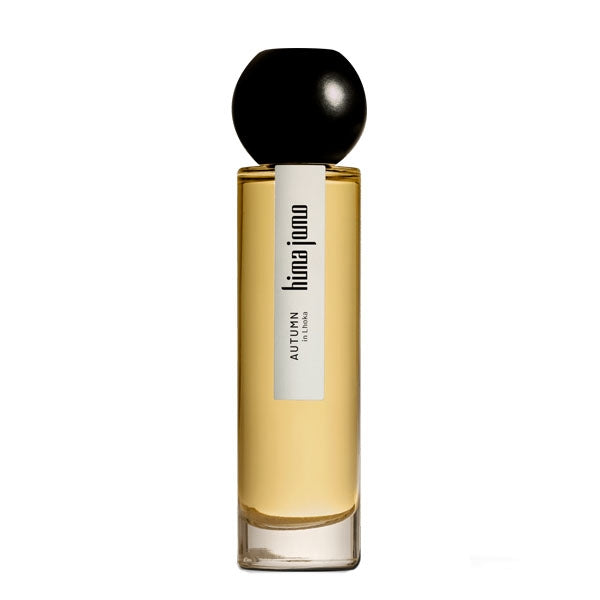 Hima Jomo - Seasons - Autumn in Lhoka eleganter Parfumflakon mit schwarzem kugelrundem Deckel und bernsteinfarbener Flüssigkeit