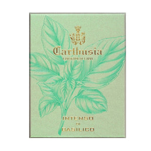 Carthusia - Intenso Collection - Basilico zeigt stilvolle Verpackung mit grünem Basilikumblatt und goldenem Logo auf hellgrünem Hintergrund