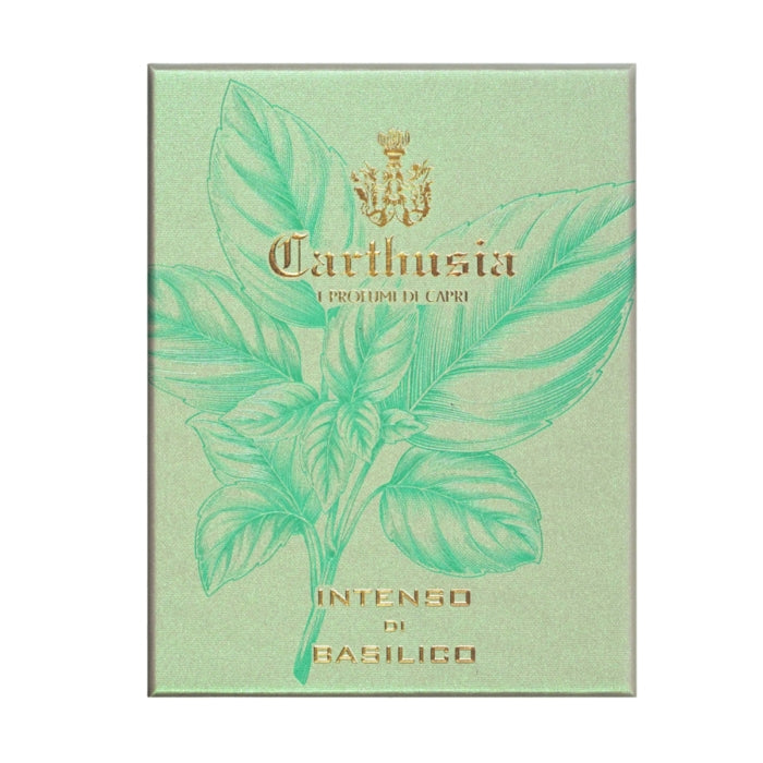 Carthusia - Intenso Collection - Basilico zeigt stilvolle Verpackung mit grünem Basilikumblatt und goldenem Logo auf hellgrünem Hintergrund