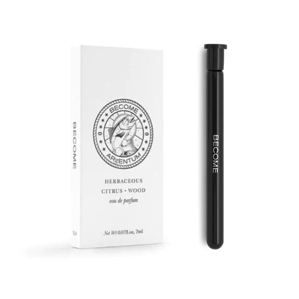 Argentum - Become - No. 0 schlanker schwarzer Duftroller mit minimalistischer weißer Verpackung und Fischmotiv