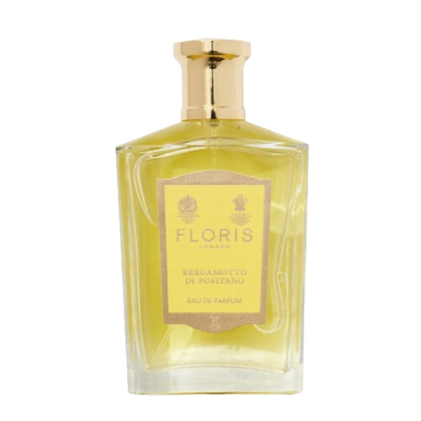 Floris - Bergamotto Di Positano Parfümflakon mit zitrusgelber Flüssigkeit und goldfarbenem Verschluss in elegantem Glasdesign