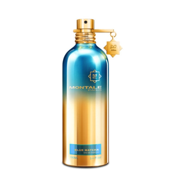 Montale - Blue Matcha eleganter gold-blauer Flakon mit goldfarbenem Verschluss und Anhänger vor weißem Hintergrund