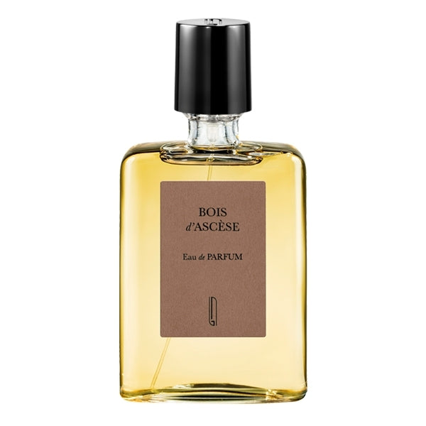 Naomi Goodsir - Bois d'Ascèse Parfumflakon mit bernsteinfarbenem Duft und schlicht elegantem Etikett in rechteckiger Form