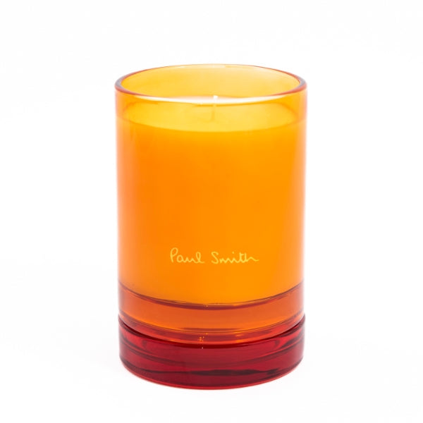 Paul Smith - Bookworm - Duftkerze in orange-rotem Glas mit schlichtem Paul Smith Logo und elegantem, warmem Design