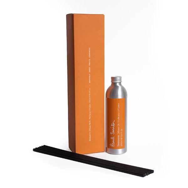 Paul Smith - Bookworm - Diffusor mit silbernem Aluminiumflakon, orangefarbenem Etikett und schwarzen Duftstäbchen
