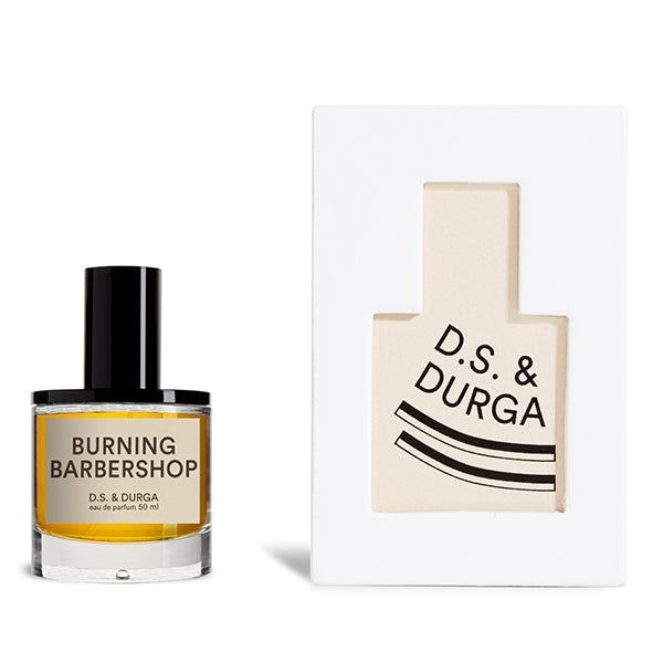 D.S. & Durga - Burning Barbershop Parfümflakon mit schwarzem Verschluss und minimalistischem Design vor weißem Hintergrund