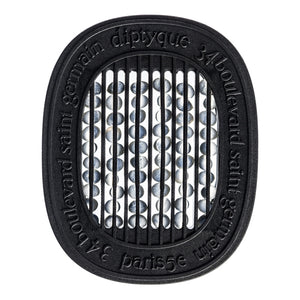 Diptyque - Figuier / Feige - Capsule mit schwarzem Gehäuse und sichtbar duftenden Perlen hinter Gitterstäben