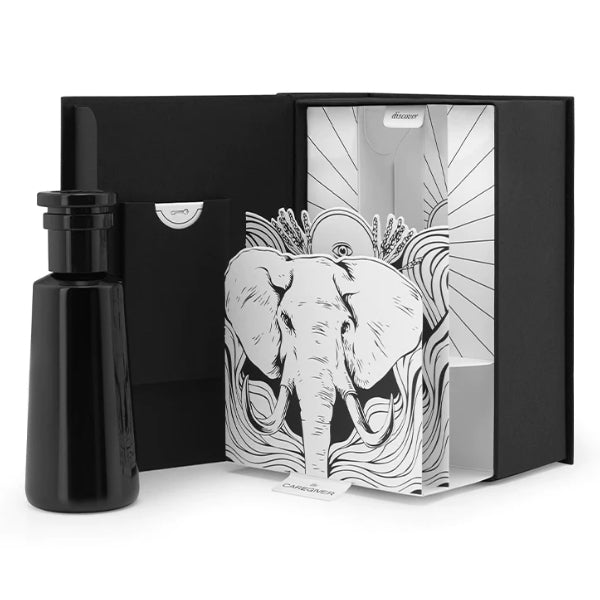 Argentum - Caregiver - Earth schwarzer Flakon mit breitem Verschluss neben geöffneter Verpackung mit Elefantenillustration