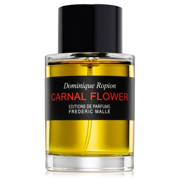 Frédéric Malle - Carnal Flower Parfumflakon mit schwarzem Verschluss und intensiv gelber Flüssigkeit vor weißem Hintergrund