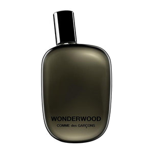 Comme des Garçons - Wonderwood eleganter dunkelgrauer Flakon mit schwarzem Verschluss auf weißem Hintergrund