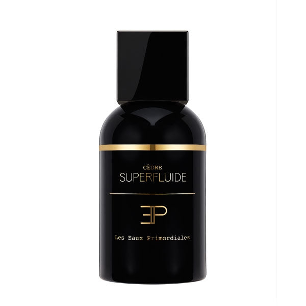 Les Eaux Primordiales - Cèdre Superfluide Parfumflakon in elegantem Schwarz mit goldenen Akzenten vor weißem Hintergrund