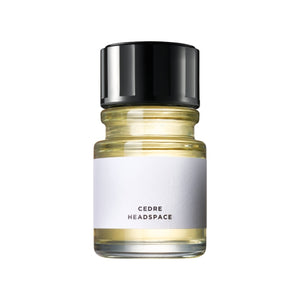 Headspace - Cédre Parfumflakon mit klarer Glasoptik und minimalistischem Etikett vor weißem Hintergrund