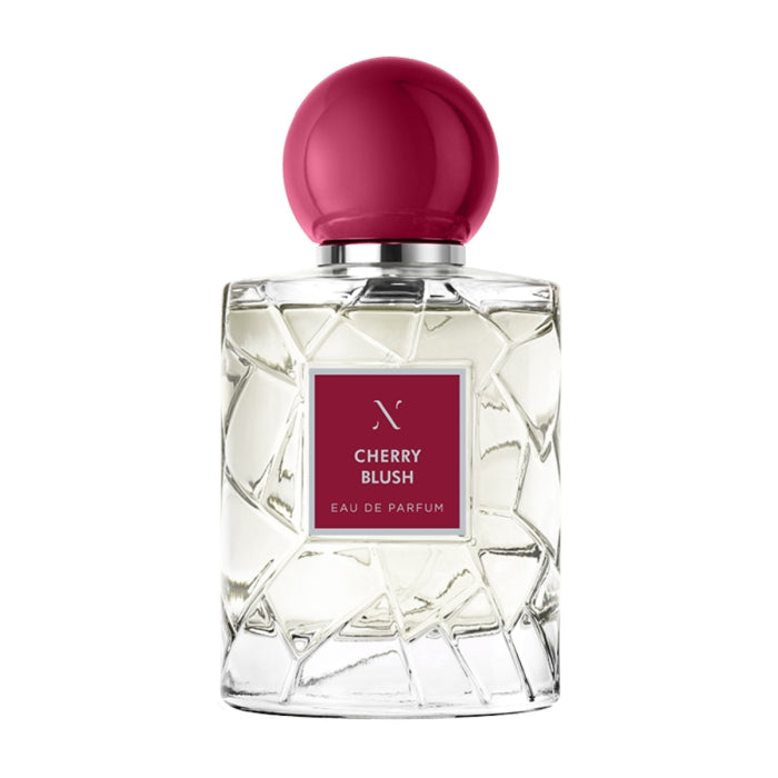 Les Sœurs de Noé - Cherry Blush Parfumflakon mit facettiertem Glas und rundem, kirschrotem Verschluss elegant gestaltet
