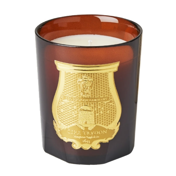 Trudon - Cire - Duftkerze im bernsteinfarbenen Glas mit goldenem Emblem und warmen, wachsartigen Duftnoten