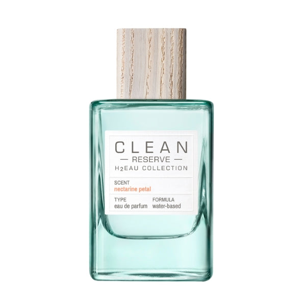Clean Perfume - H2Eau Nectarine Petal Parfümflakon mit klarem Glas und hellem Holzverschluss vor weißem Hintergrund