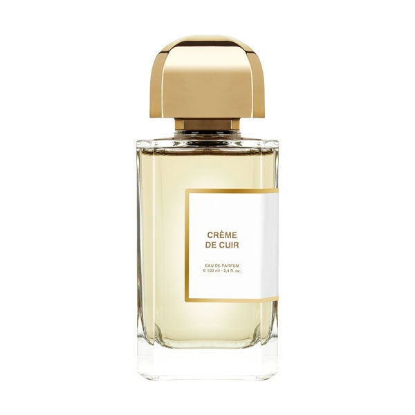 bdk Parfums - Collection Matières - Crème de Cuir eleganter Parfumflakon mit goldenem Verschluss und hellem Duft vor weißem Hintergrund