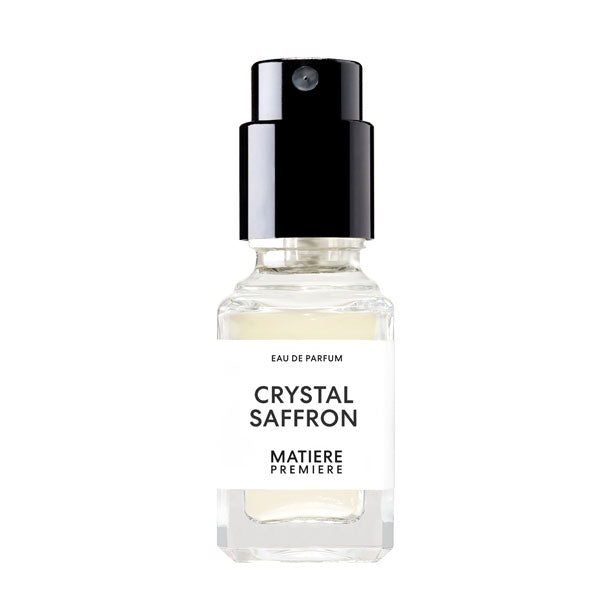 Matière Première - Crystal Saffron zeigt kleinen Flakon mit schwarzem Zerstäuber und hellem Duft vor weißem Hintergrund