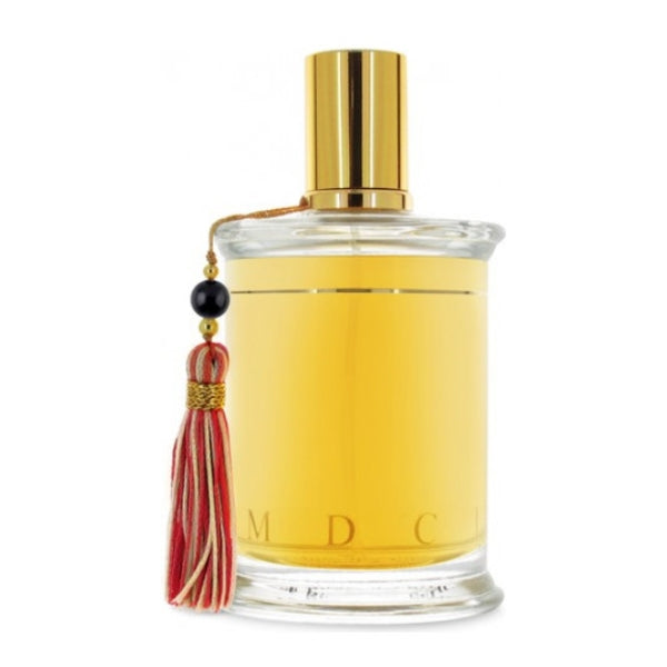 Parfums MDCI Paris - Cuir Garamante Duftflakon mit goldenem Verschluss und rotem Tassel-Detail edel gestaltet
