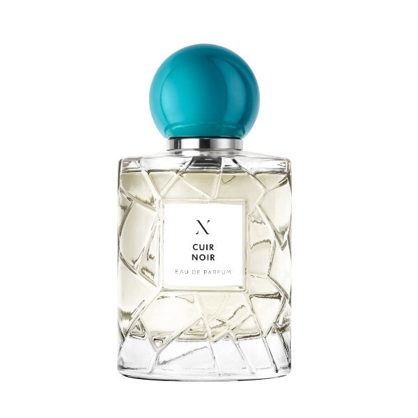 Les Sœurs de Noé - Cuir Noir zeigt eleganten Glasflakon mit blauem, rundem Verschluss vor weißem Hintergrund
