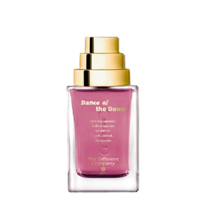 The Different Company - Dance of the Dawn Parfumflakon mit goldfarbenem Verschluss und violettem Duftglas vor weißem Hintergrund