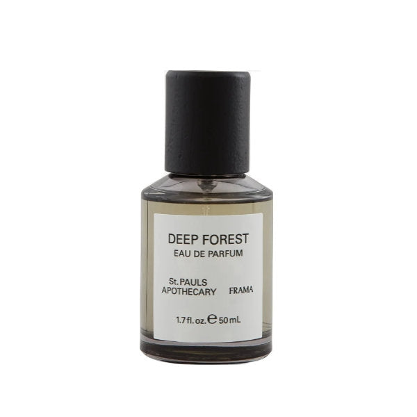 FRAMA - Deep Forest Eau de Parfum in klarer Flasche mit schwarzem Holzdeckel vor weißem Hintergrund