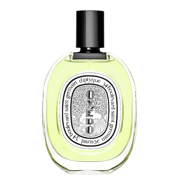 Diptyque - Oyédo Eau de Toilette in ovalem Flakon mit schwarzem Verschluss und hellem gelb-grünem Inhalt vor weißem Hintergrund