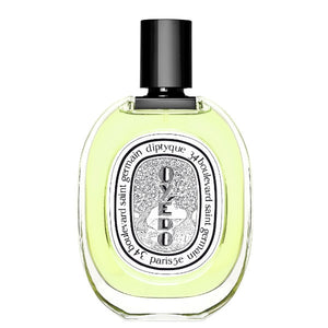 Diptyque - Oyédo Eau de Toilette in ovalem Flakon mit schwarzem Verschluss und hellem gelb-grünem Inhalt vor weißem Hintergrund