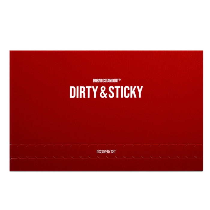 BORNTOSTANDOUT - Dirty & Sticky Discovery Set in rotem Design mit weißer Schrift elegant präsentiert
