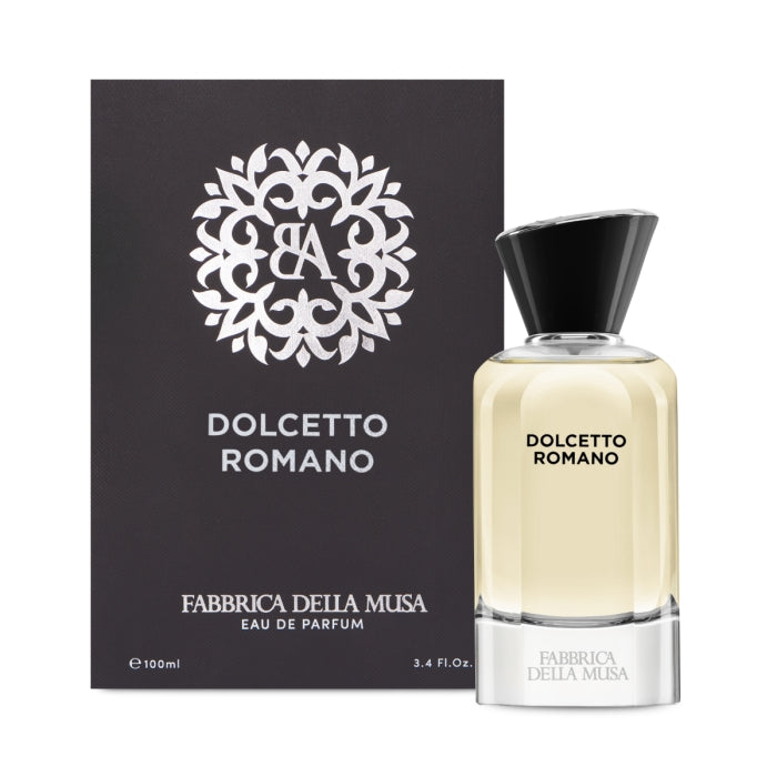 Fabbrica della Musa - Dolcetto Romano dezenter Flakon mit milchiger Flüssigkeit und schwarzem Deckel vor dunkler Verpackung