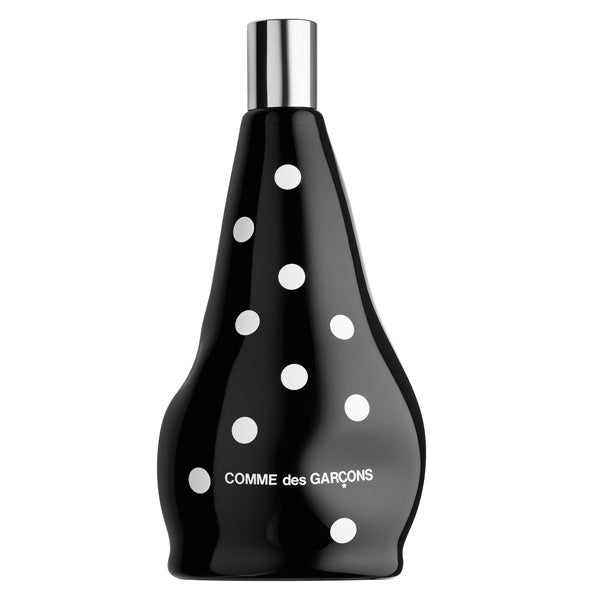Comme des Garçons - DOT Flakon mit schwarzer, unregelmäßiger Form und weißen Punkten vor weißem Hintergrund