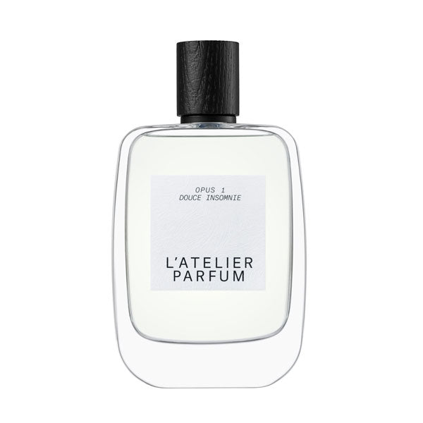 L'Atelier Parfum - Opus 1 - Douce Insomnie klarer Flakon mit schwarzem Holzverschluss vor weißem Hintergrund