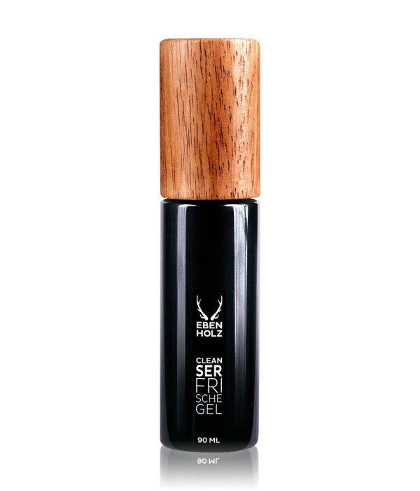 EBENHOLZ - Cleanser Frische Gel in elegantem schwarzen Flakon mit naturholzfarbenem Verschluss vor weißem Hintergrund