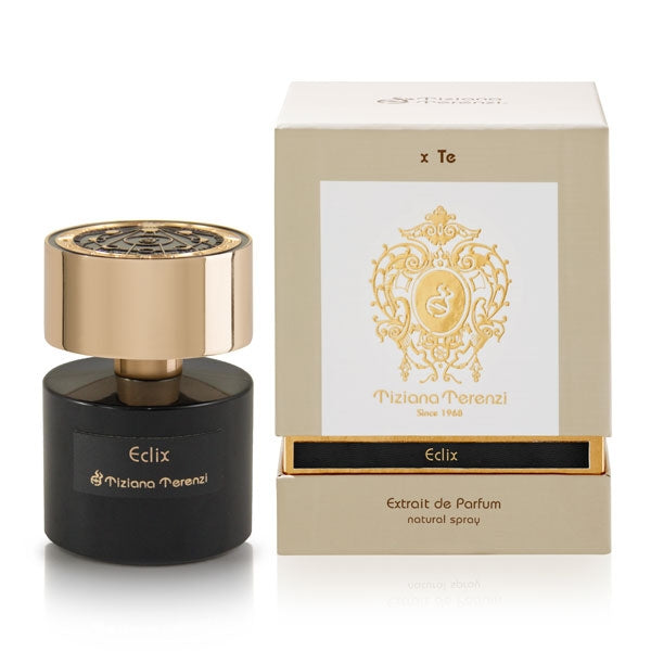 Tiziana Terenzi - Eclix Parfumflakon in schwarzem Glas mit goldfarbenem Deckel neben eleganter beigefarbener Box