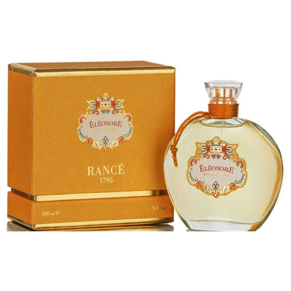 Rancé 1795 - Collection Impériale pour Femme - Éléonore Parfumflakon mit goldener Verpackung und elegantem Design vor weißem Hintergrund