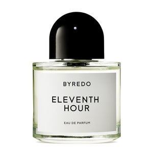 Byredo - Eleventh Hour klarer runder Flakon mit schwarzem runden Verschluss vor weißem Hintergrund