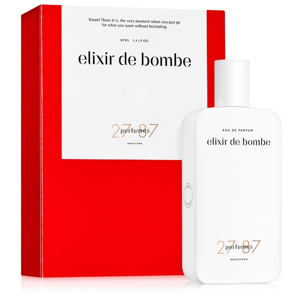 27 87 Perfumes - elixir de bombe Parfumflakon in schlichtem Weiß vor roter Verpackung mit klarer Typografie