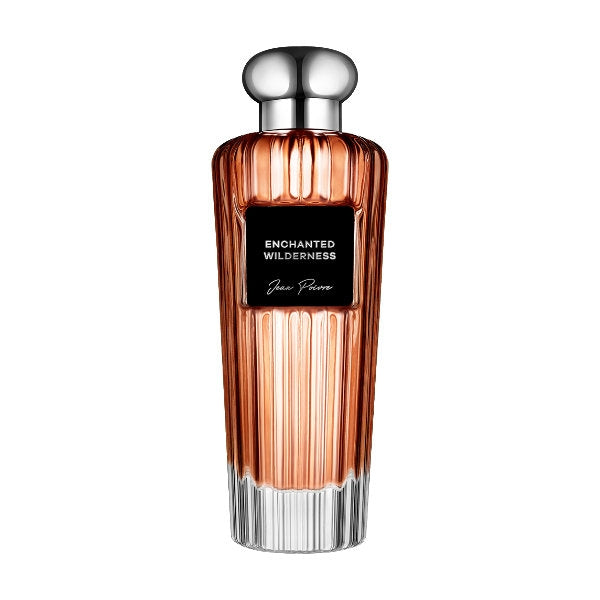 Jean Poivre - Enchanted Wilderness Parfumflakon mit warmem Bernsteinton und geriffeltem Glas, silberner Deckel elegant gestaltet