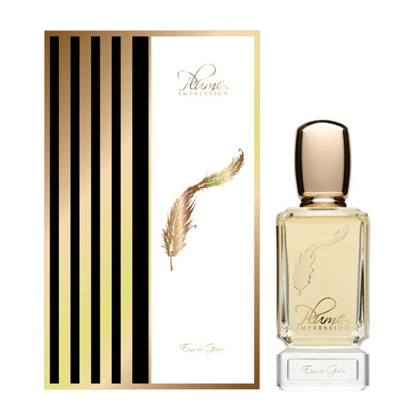 Plume Impression - Etat de Grâce zeigt eleganten Flakon mit goldgelber Flüssigkeit und passender Verpackung mit Feder-Motiv vor weißem Hintergrund